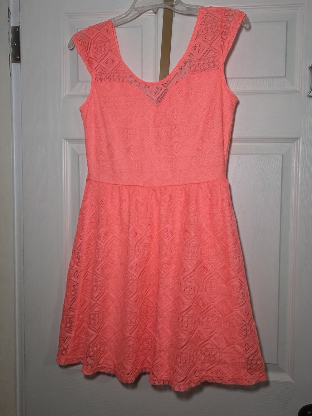 Women's coral lace garment label